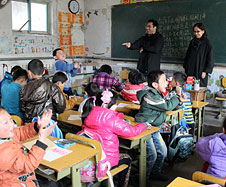 Michael Santoro and Yafonne Chen at Tong Xin School in Beijing (2013)